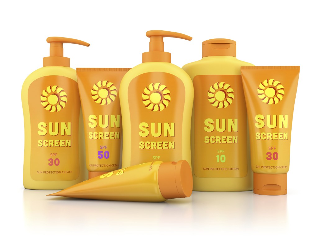 Bottles and tubes of sunscreen