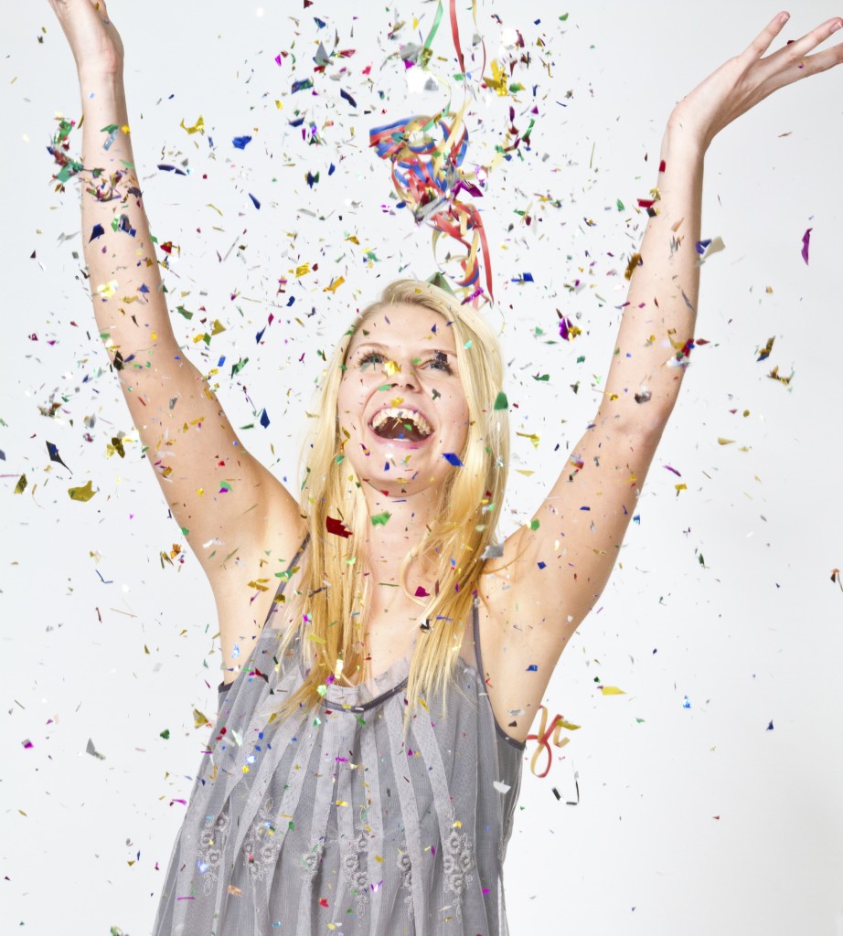 Woman throwing confetti