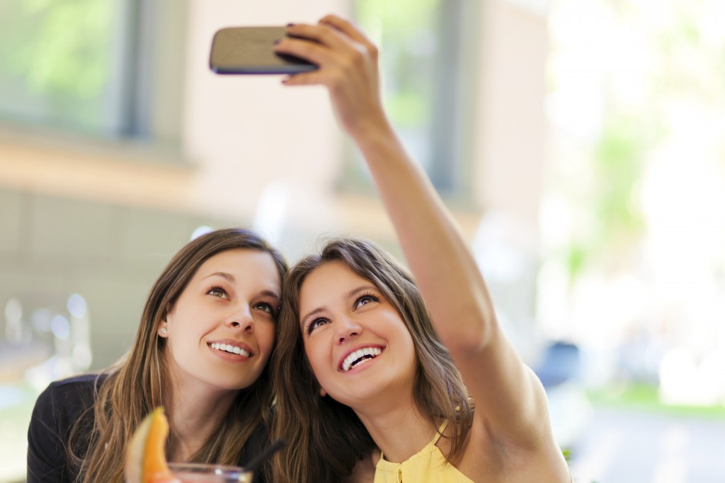 Selfie, girls taking a photo of theirselves