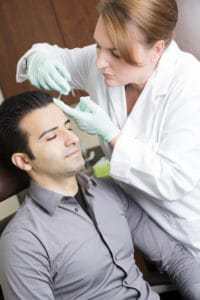 Businessman getting botox treatment at the medical spa.