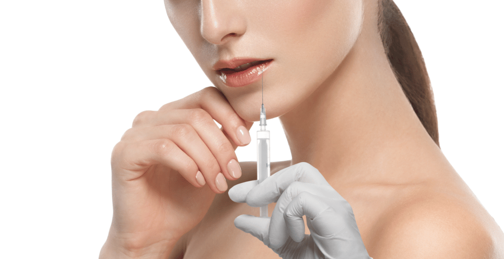young woman with cosmetic syringe