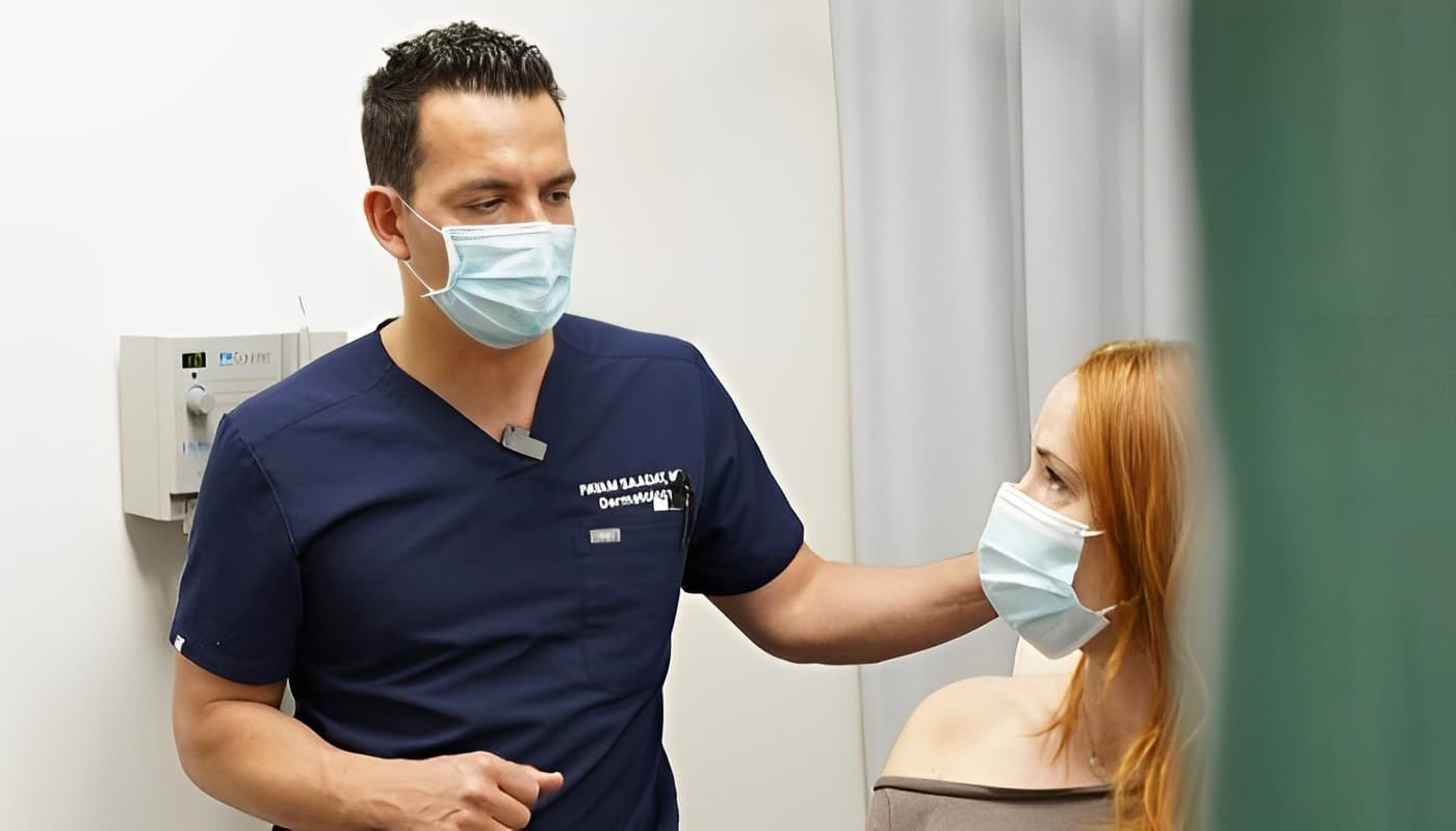 Dr. Saadat Advising a Young Woman During Her Consult 2 (1)