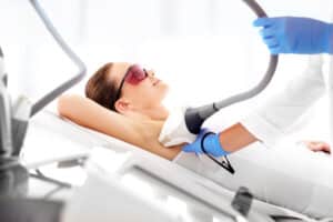 Woman on underarm laser hair removal
