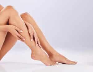 Closeup,,Skincare,And,Legs,With,Cosmetics,,Dermatology,And,Treatment,Against