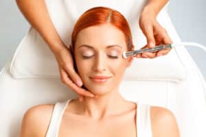 Relaxed woman getting microdermabrasion treatment in Los Angeles, CA